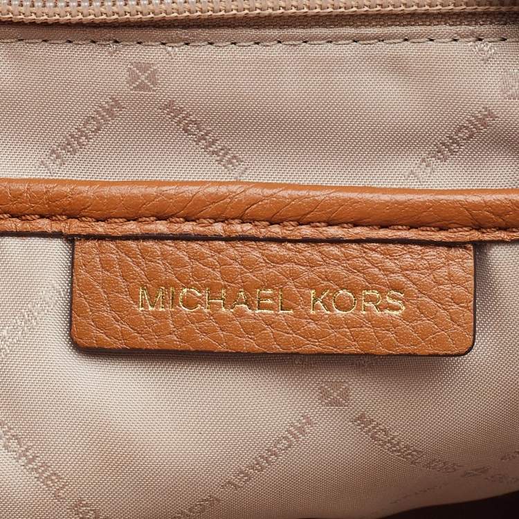 Pre Owned Michael Kors Brown Signature Coated Canvas and Leather Studded Abbey Backpack