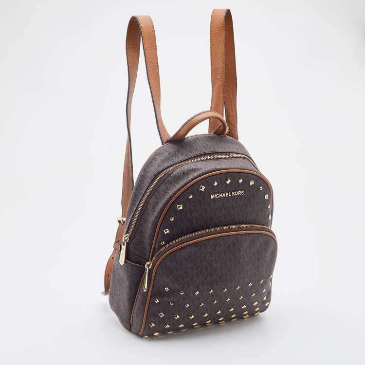 Pre Owned Michael Kors Brown Signature Coated Canvas and Leather Studded Abbey Backpack