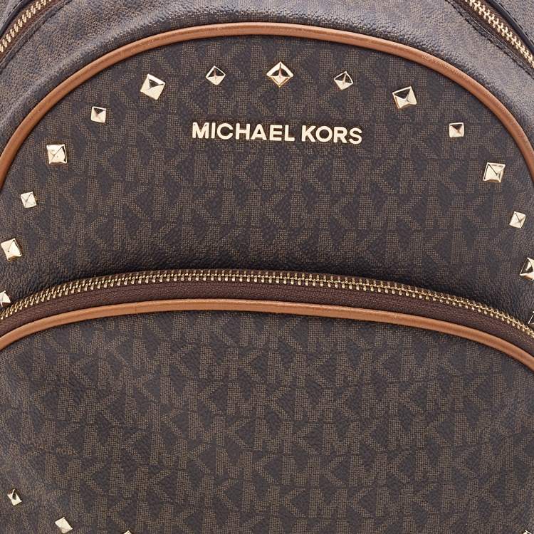 Pre Owned Michael Kors Brown Signature Coated Canvas and Leather Studded Abbey Backpack