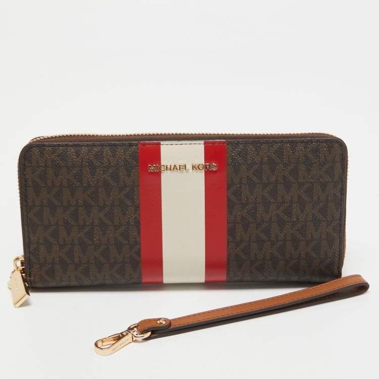 Pre Owned Michael Kors Brown Signature Coated Canvas Zip Around Wristlet Wallet