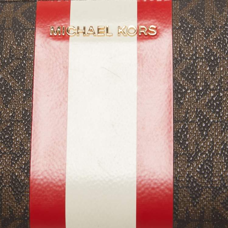 Pre Owned Michael Kors Brown Signature Coated Canvas Zip Around Wristlet Wallet