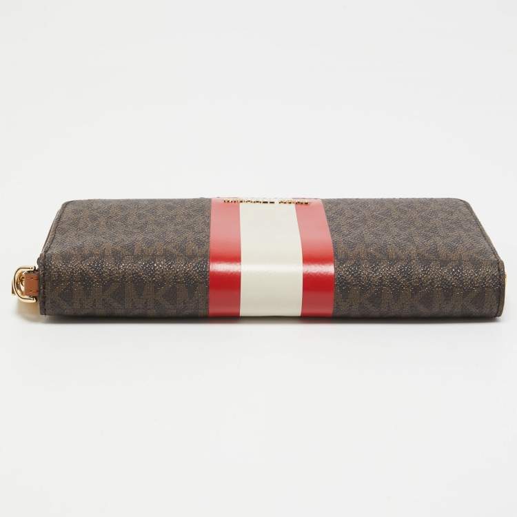Pre Owned Michael Kors Brown Signature Coated Canvas Zip Around Wristlet Wallet