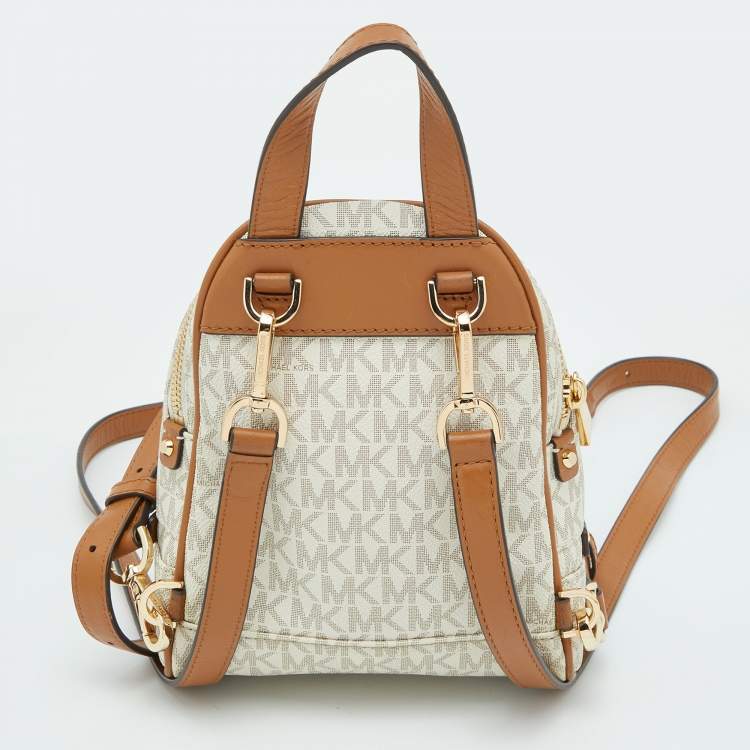 Pre Owned Michael Kors White/Tan Signature Coated Canvas and Leather Mini Rhea Backpack