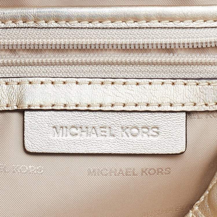 Pre Owned Michael Kors Gold Holographic Leather Medium Rhea Backpack