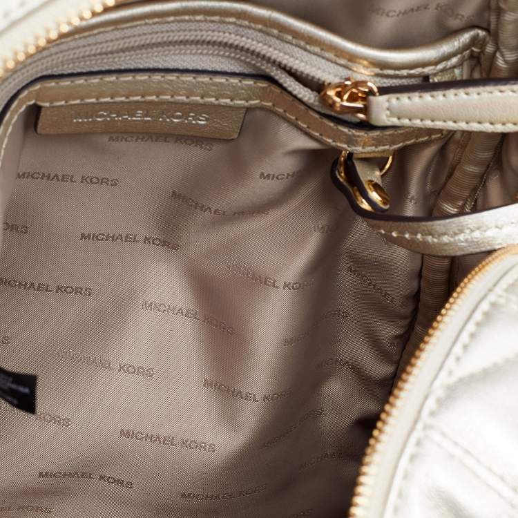 Pre Owned Michael Kors Gold Holographic Leather Medium Rhea Backpack