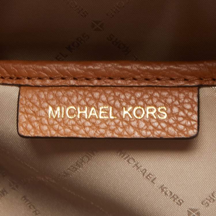 Pre Owned Michael Kors Beige/Tan Signature Coated Canvas and Leather Abbey Backpack