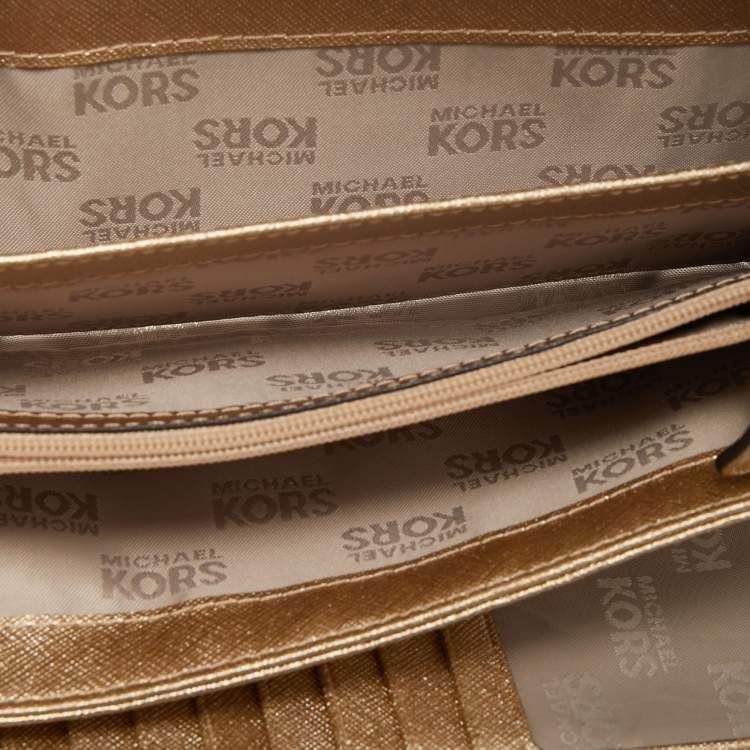 Pre Owned Michael Kors Brown Signature Coated Canvas Strap Zip Around Wallet