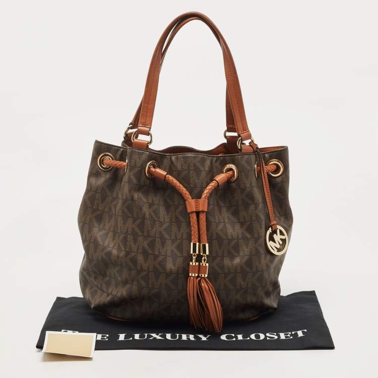 Pre Owned MICHAEL Michael Kors Brown/Tan Signature Coated Canvas and Leather Jet Set Drawstring Bag