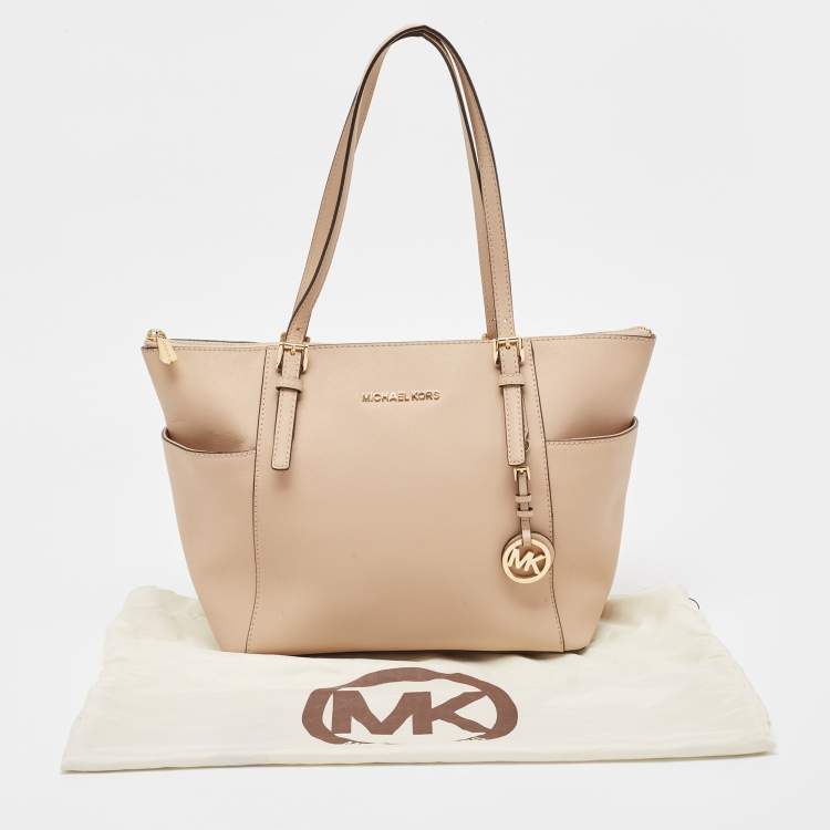 Pre Owned Michael Kors Beige Leather Medium Jet Set Top Zip Tote