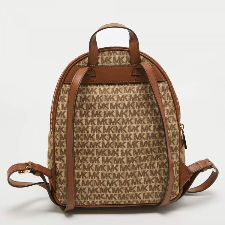 Pre Owned Michael Kors Beige/Tan Signature Canvas and Leather Backpack