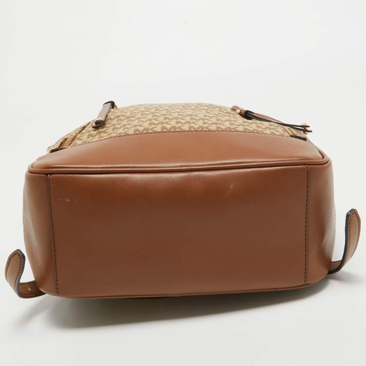 Pre Owned Michael Kors Beige/Tan Signature Canvas and Leather Backpack