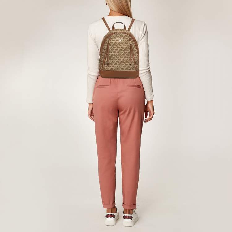 Pre Owned Michael Kors Beige/Tan Signature Canvas and Leather Backpack