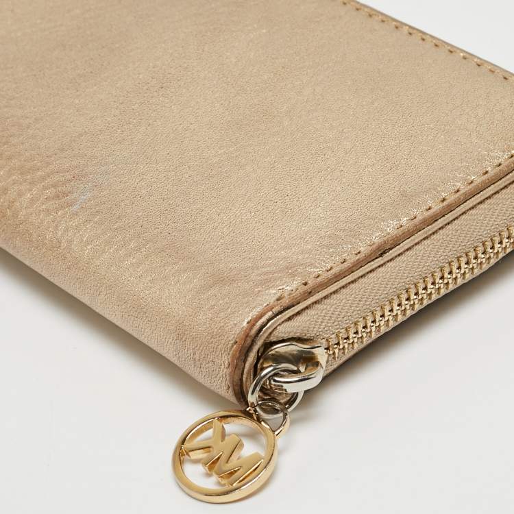 Pre Owned Michael Kors Gold Leather Jet Set Zip Around Continental Wallet
