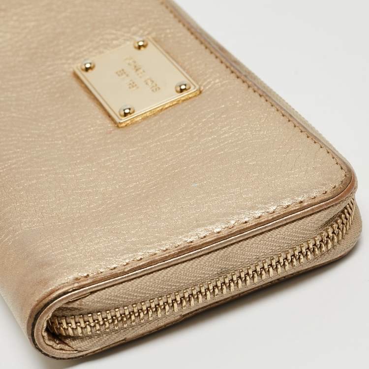 Pre Owned Michael Kors Gold Leather Jet Set Zip Around Continental Wallet