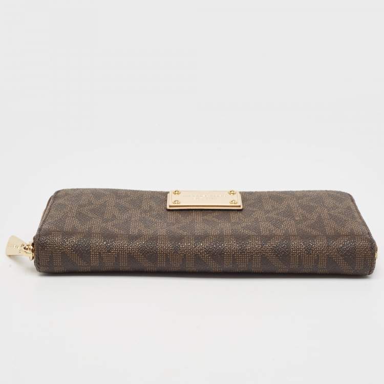 Pre Owned Michael Kors Brown Signature Coated Canvas Logo Zip Around Wallet