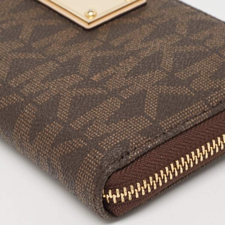 Pre Owned Michael Kors Brown Signature Coated Canvas Logo Zip Around Wallet