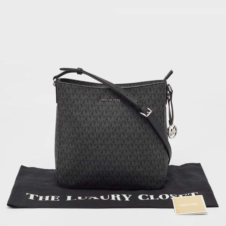 Pre Owned Michael Kors Black Signature Coated Canvas and Leather Large Jet Set Travel Messenger Bag