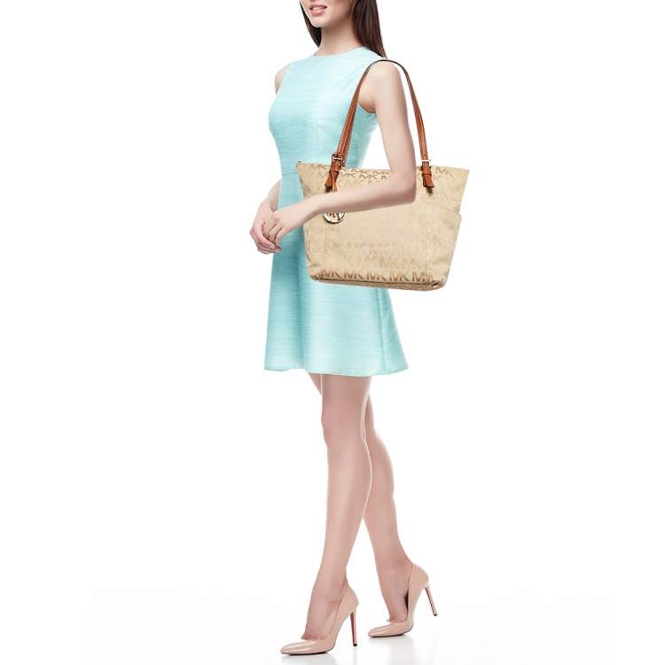 Pre Owned MICHAEL Michael Kors Beige/Brown Signature Canvas and Leather Jet Set Top Zip Tote