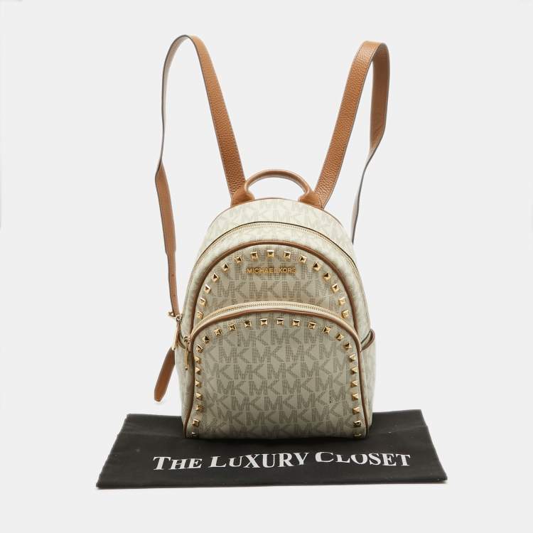 Pre Owned MICHAEL Michael Kors Off White Signature Coated Canvas Studded Abbey Backpack