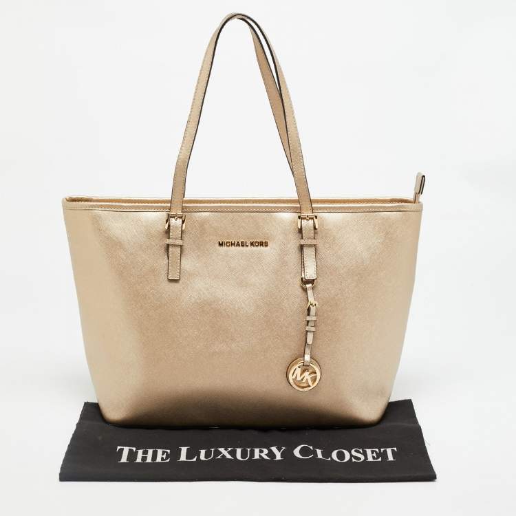 Pre Owned MICHAEL Michael Kors Jet Set Travel Pale Gold Leather Tote