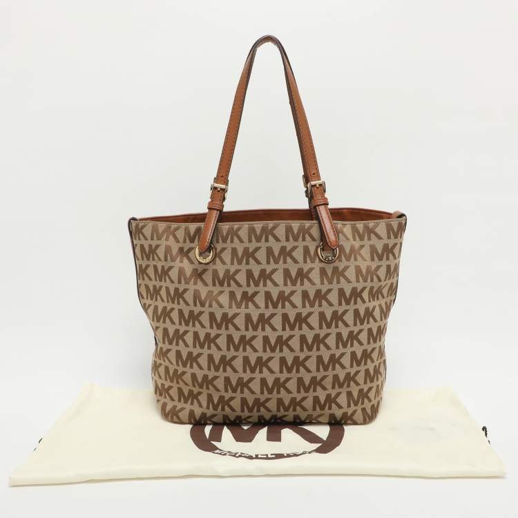 Pre Owned MICHAEL Michael Kors Jet Set Beige/Brown Signature Canvas and Leather Shopper Tote