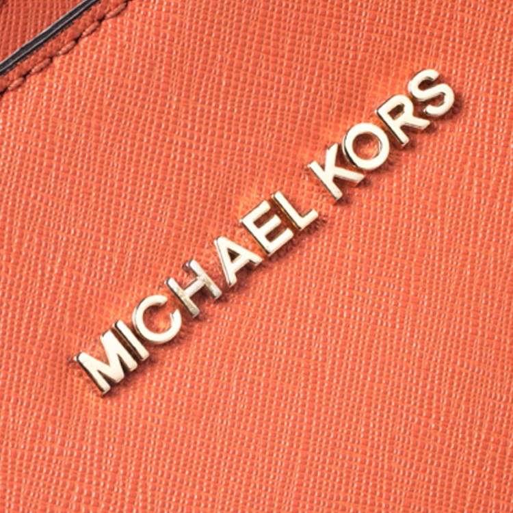 Pre Owned Michael Michael Kors Orange Leather Jet Set Travel Messenger