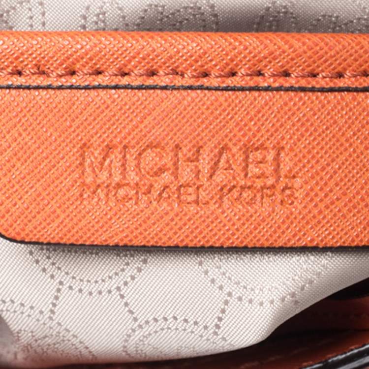 Pre Owned Michael Michael Kors Orange Leather Jet Set Travel Messenger