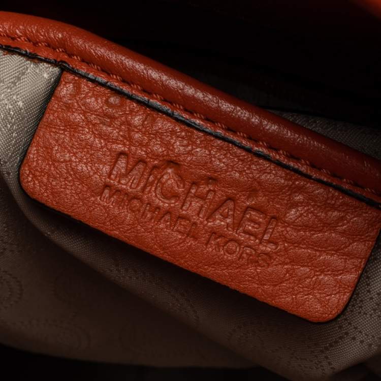 Pre Owned MICHAEL Michael Kors Orange Woven Leather Large Hamilton North South Tote
