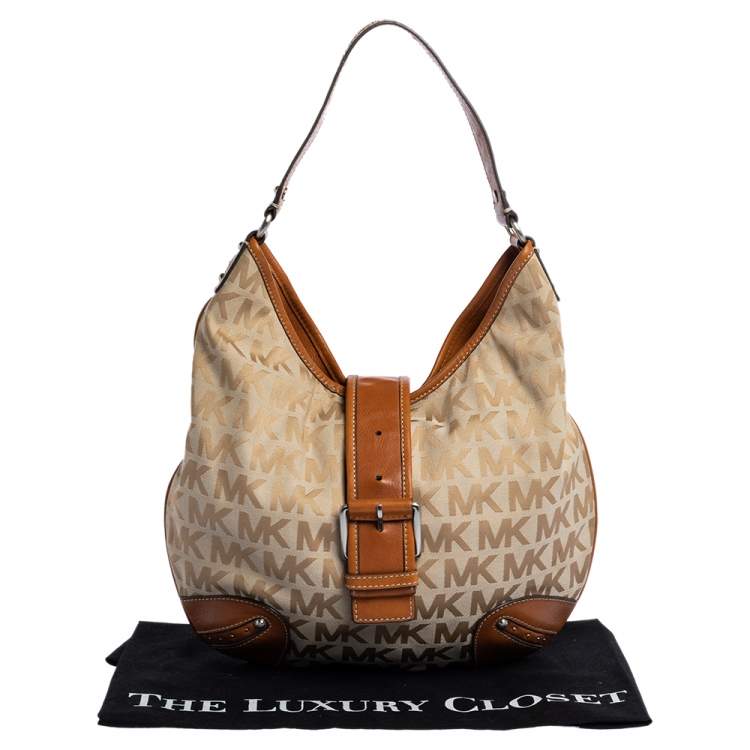 Pre Owned Michael Michael Kors Beige/Tan Signature Canvas and Leather Hobo