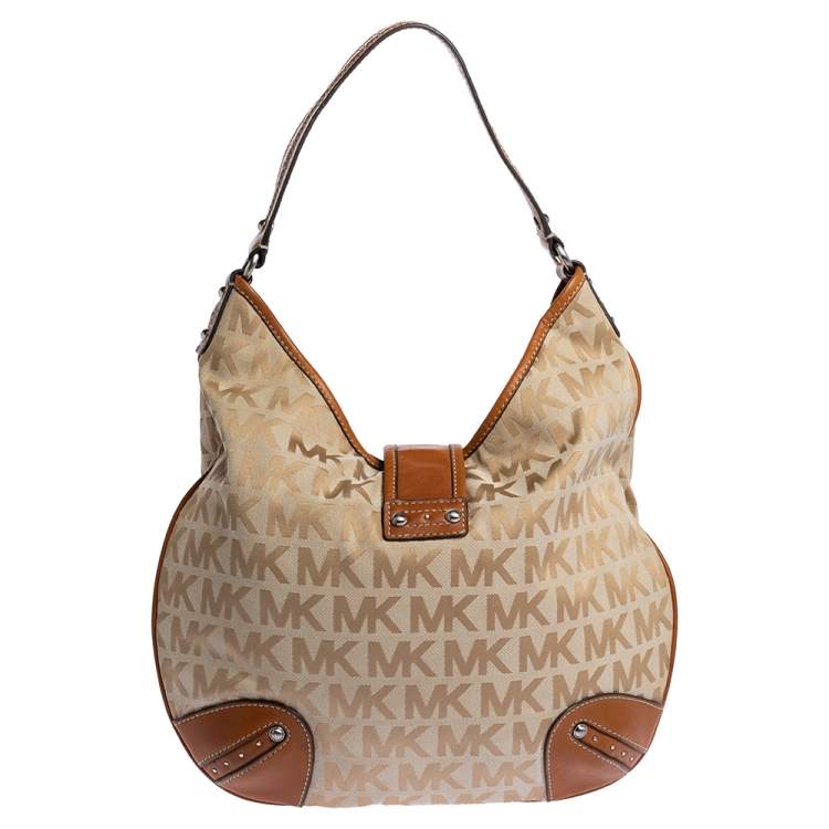 Pre Owned Michael Michael Kors Beige/Tan Signature Canvas and Leather Hobo