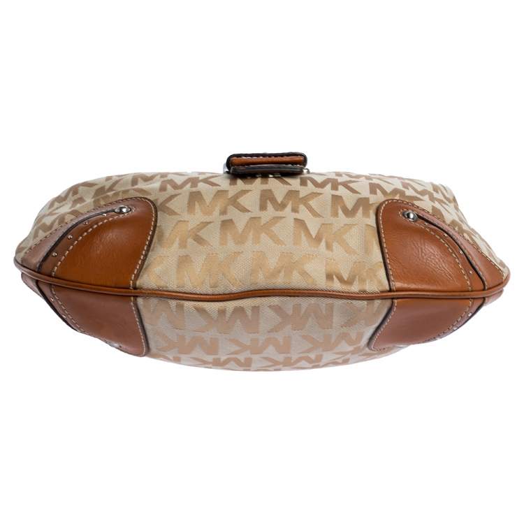 Pre Owned Michael Michael Kors Beige/Tan Signature Canvas and Leather Hobo