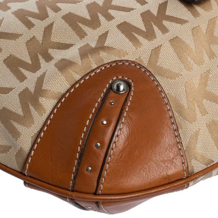 Pre Owned Michael Michael Kors Beige/Tan Signature Canvas and Leather Hobo