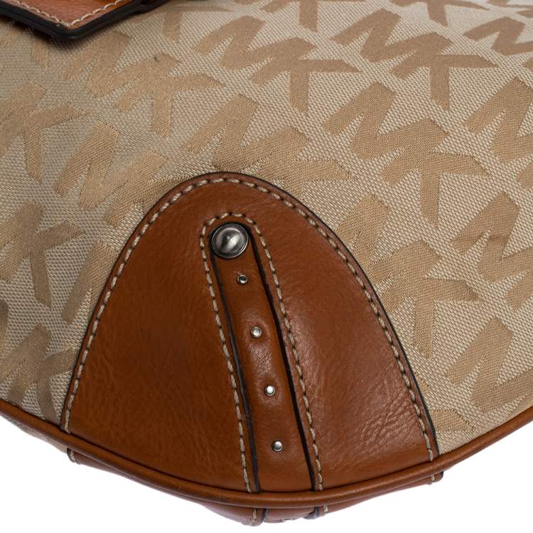 Pre Owned Michael Michael Kors Beige/Tan Signature Canvas and Leather Hobo