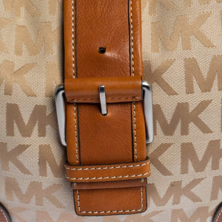 Pre Owned Michael Michael Kors Beige/Tan Signature Canvas and Leather Hobo