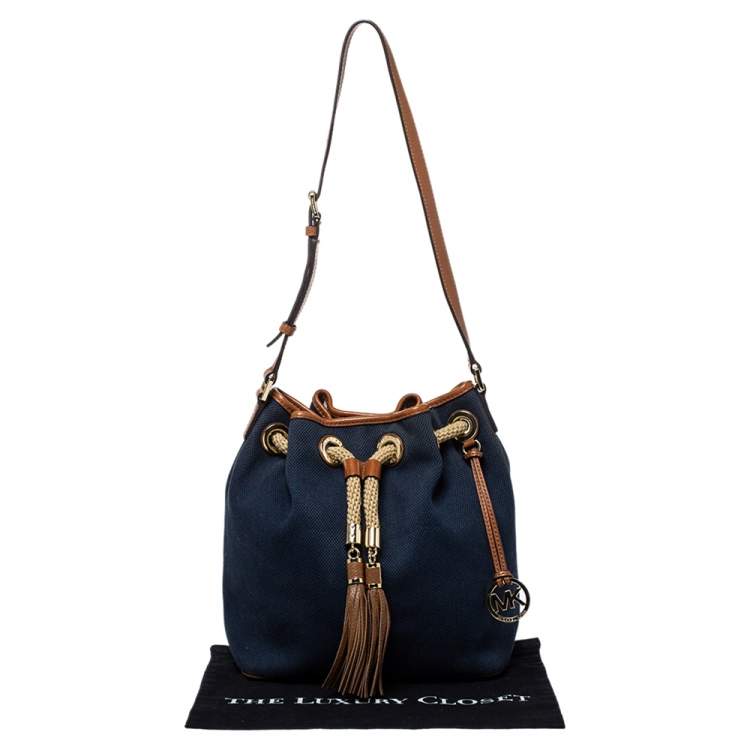 Pre Owned Michael Michael Kors Navy Blue/Brown Canvas and Leather Marina Drawstring Bucket Bag