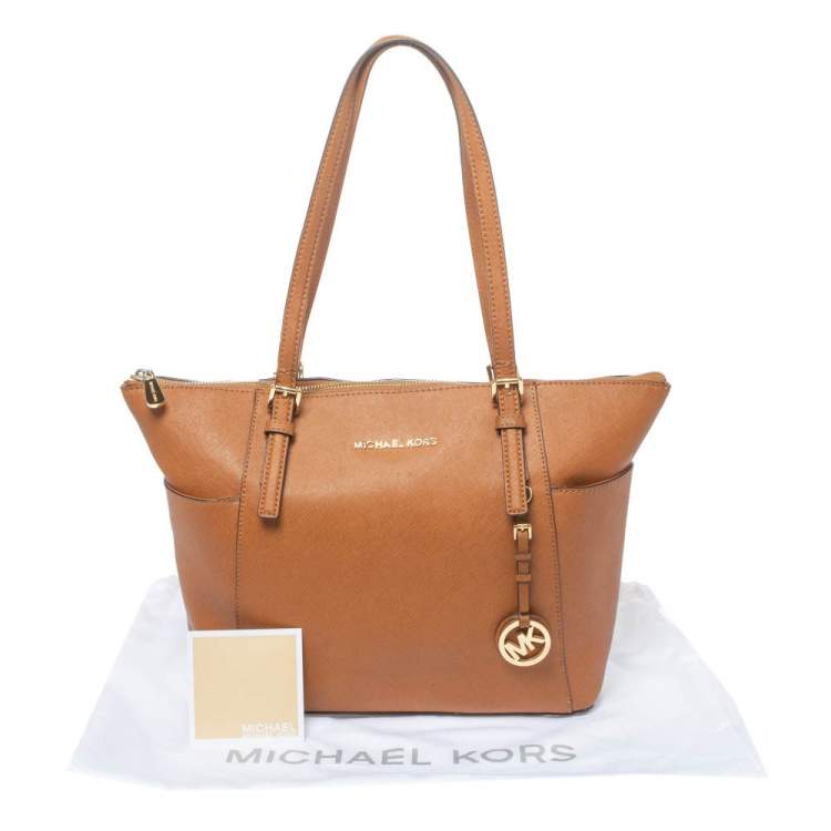 Pre Owned Michael Kors Brown Leather Medium Jet Set Top Zip Tote