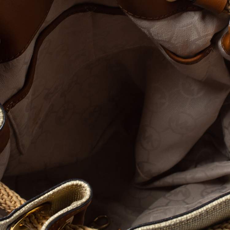 Pre Owned MICHAEL Michael Kors Gold Shimmer Canvas and Leather Tassel Drawstring Shoulder Bag