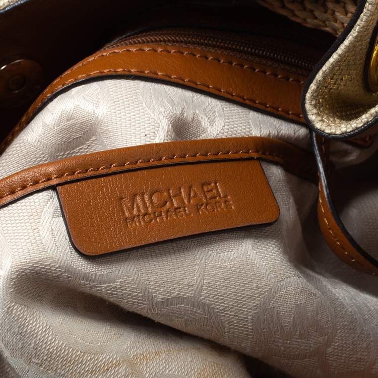 Pre Owned MICHAEL Michael Kors Gold Shimmer Canvas and Leather Tassel Drawstring Shoulder Bag