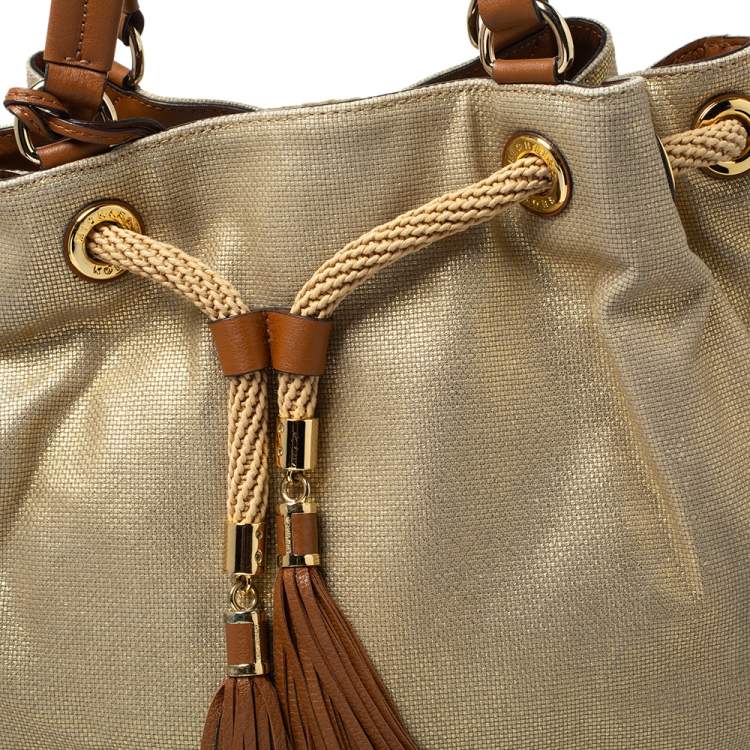 Pre Owned MICHAEL Michael Kors Gold Shimmer Canvas and Leather Tassel Drawstring Shoulder Bag
