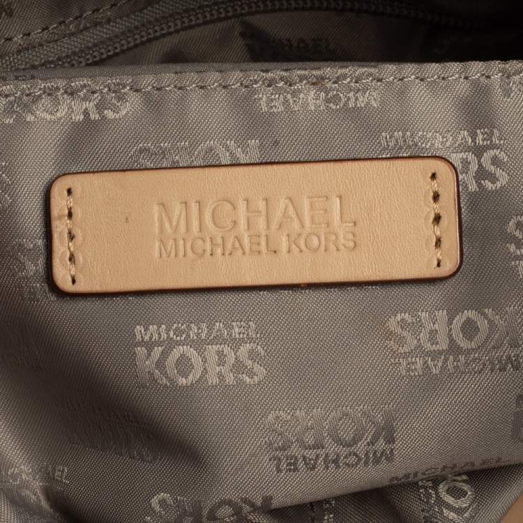 Pre Owned MICHAEL Michael Kors Metallic Silver Mirror Signature PVC and Leather North South Jet Set Tote