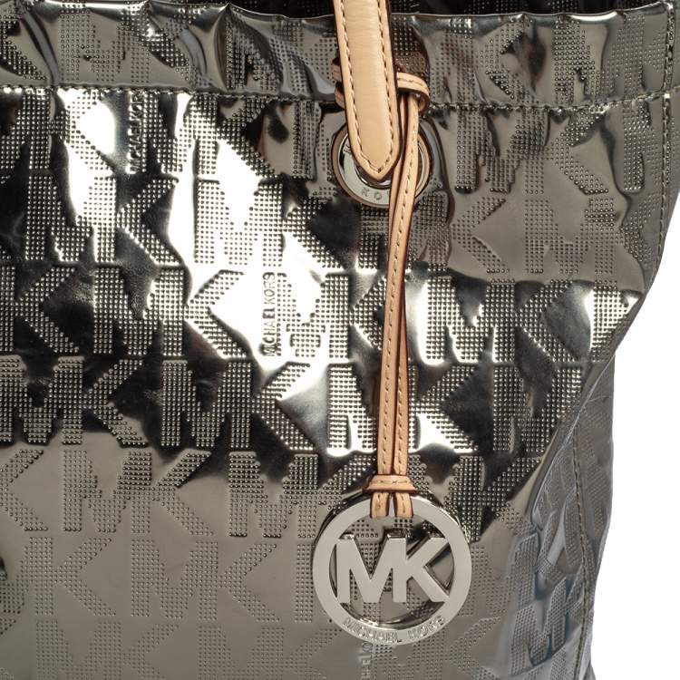Pre Owned MICHAEL Michael Kors Metallic Silver Mirror Signature PVC and Leather North South Jet Set Tote