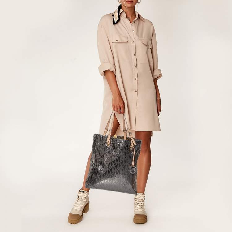 Pre Owned MICHAEL Michael Kors Metallic Silver Mirror Signature PVC and Leather North South Jet Set Tote