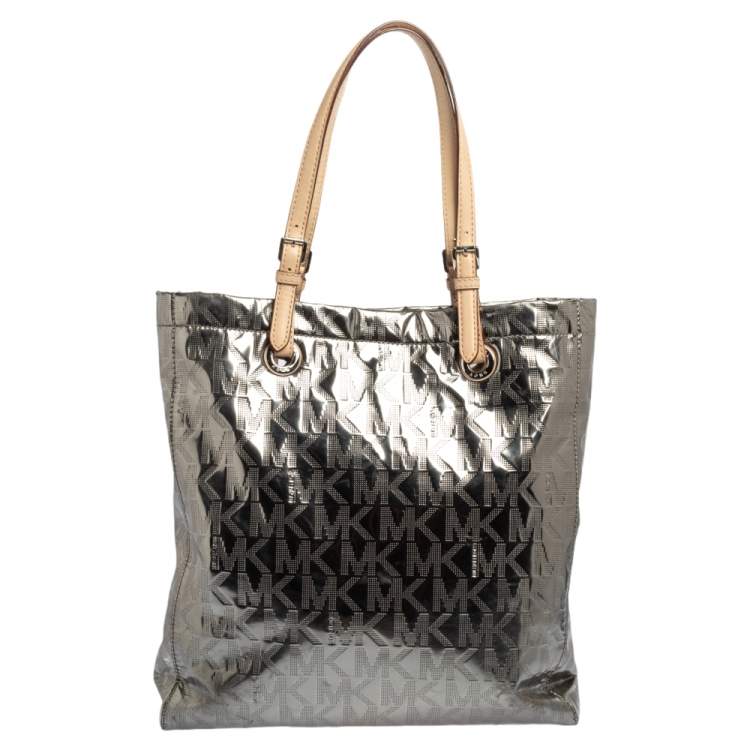 Pre Owned MICHAEL Michael Kors Metallic Silver Mirror Signature PVC and Leather North South Jet Set Tote