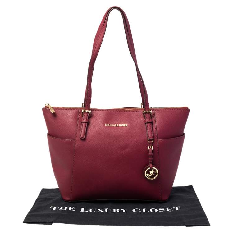 Pre Owned MICHAEL Michael Kors Burgundy Leather Large Jet Set Travel Tote