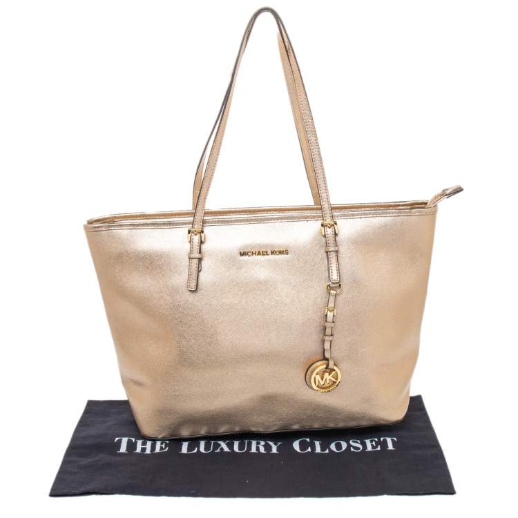 Pre Owned MICHAEL Michael Kors Metallic Gold Leather Large Jet Set Travel Tote