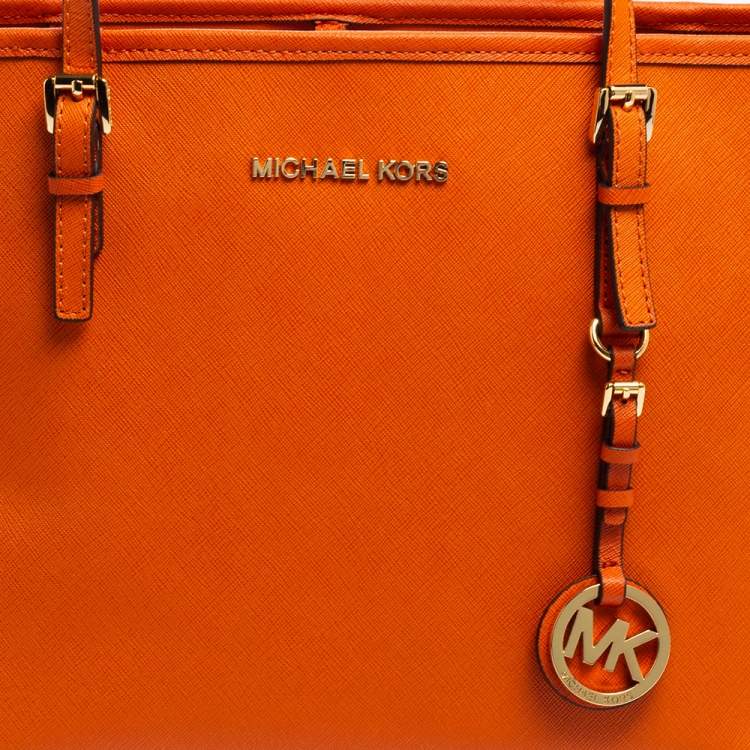 Pre Owned MICHAEL Michael Kors Orange Saffiano Leather Jet Set Travel Tote