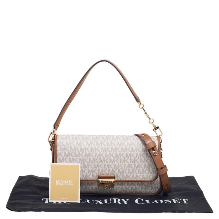 Pre Owned Michael Kors White/Brown Signature Canvas and Leather Bradshaw Logo Convertible Shoulder Bag