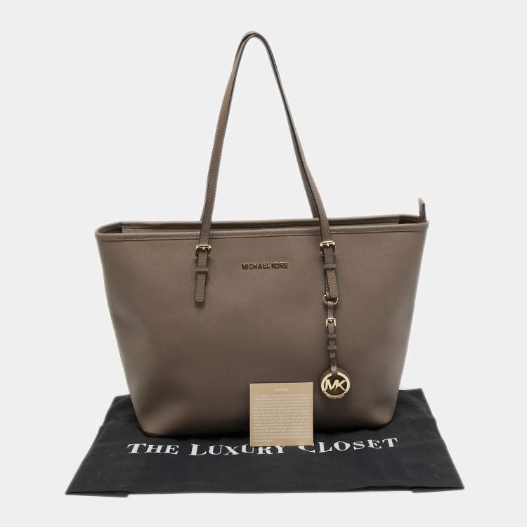 Pre Owned MICHAEL Michael Kors Beige Leather Medium Jet Set Travel Tote