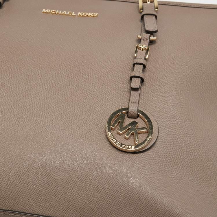 Pre Owned MICHAEL Michael Kors Beige Leather Medium Jet Set Travel Tote