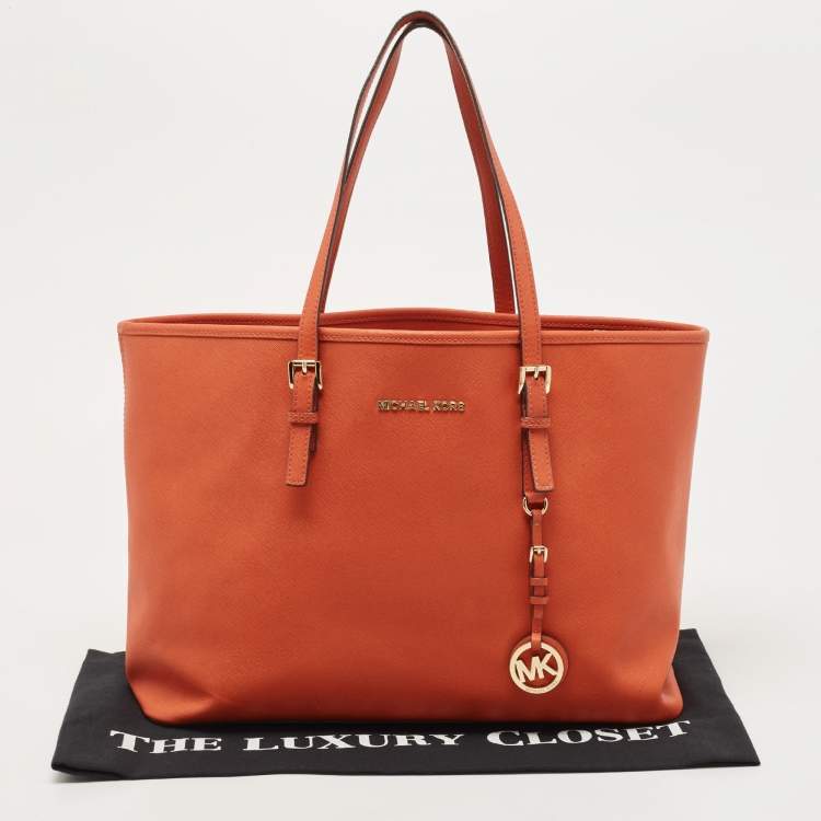 Pre Owned MICHAEL Michael Kors Orange Saffiao Leather Large Jet Set Travel Tote